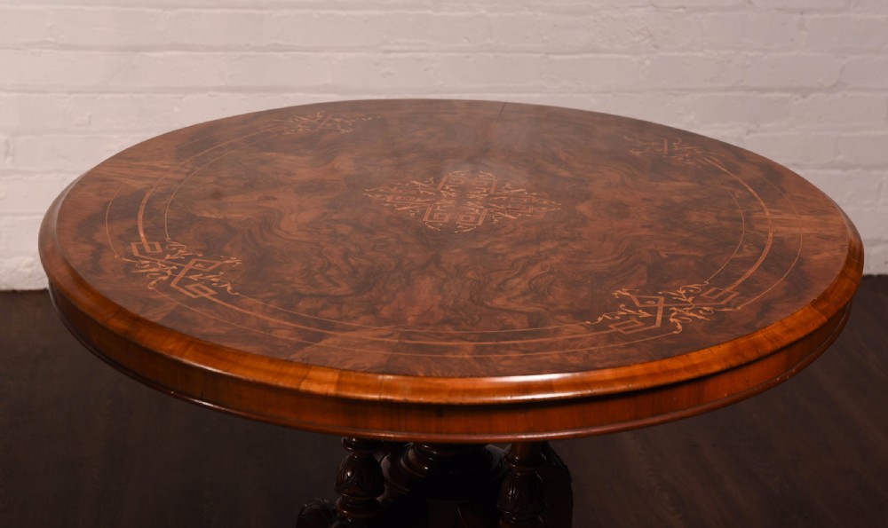 Stunning Figured walnut inlaid oval snap top loo table  View XIV
