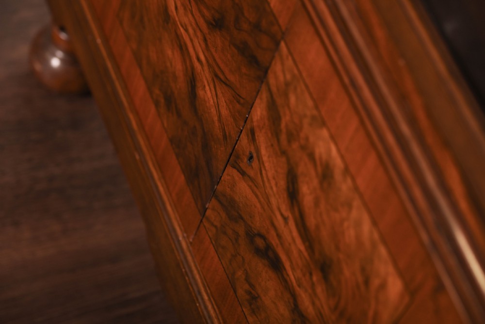 A neat Walnut single door glazed bookcase  View II