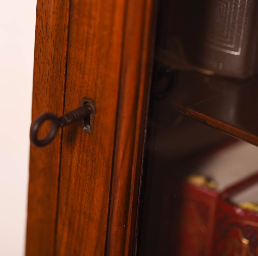A neat Walnut single door glazed bookcase  View IV