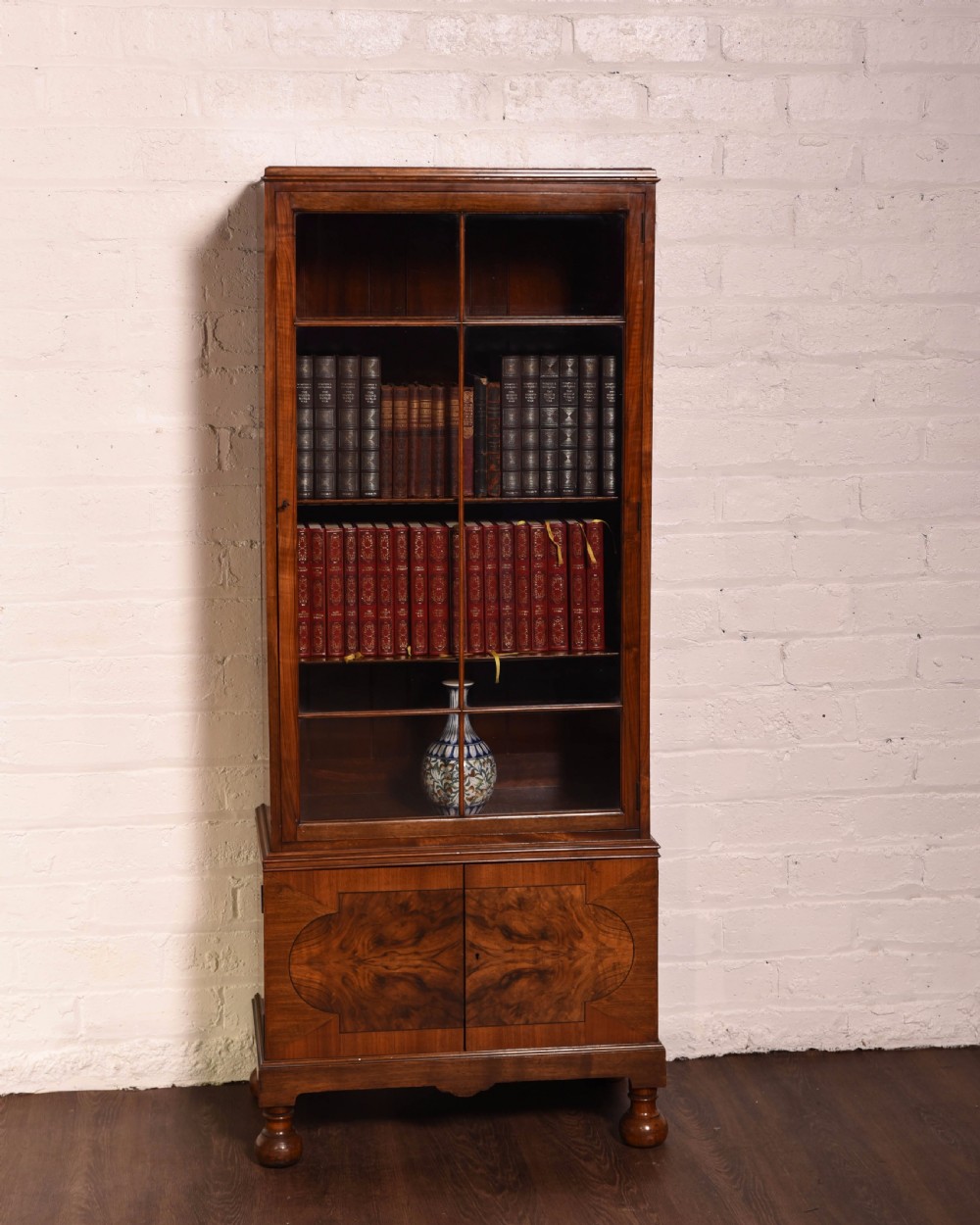 A neat Walnut single door glazed bookcase  View VIII