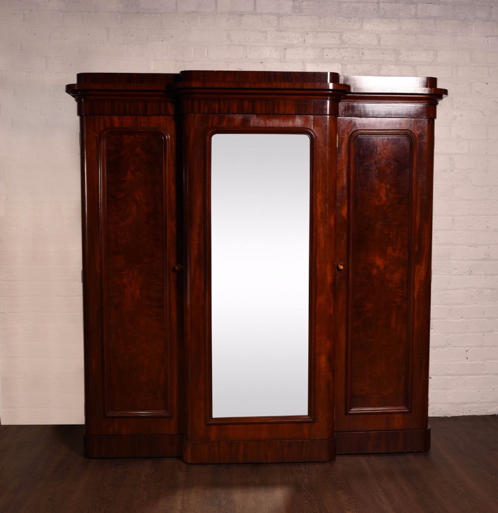 Impressive Victorian mirror door break front wardrobe 