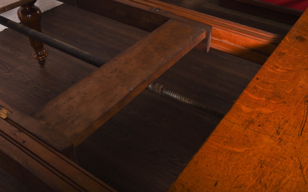Victorian Oak extending dining table  View XVI
