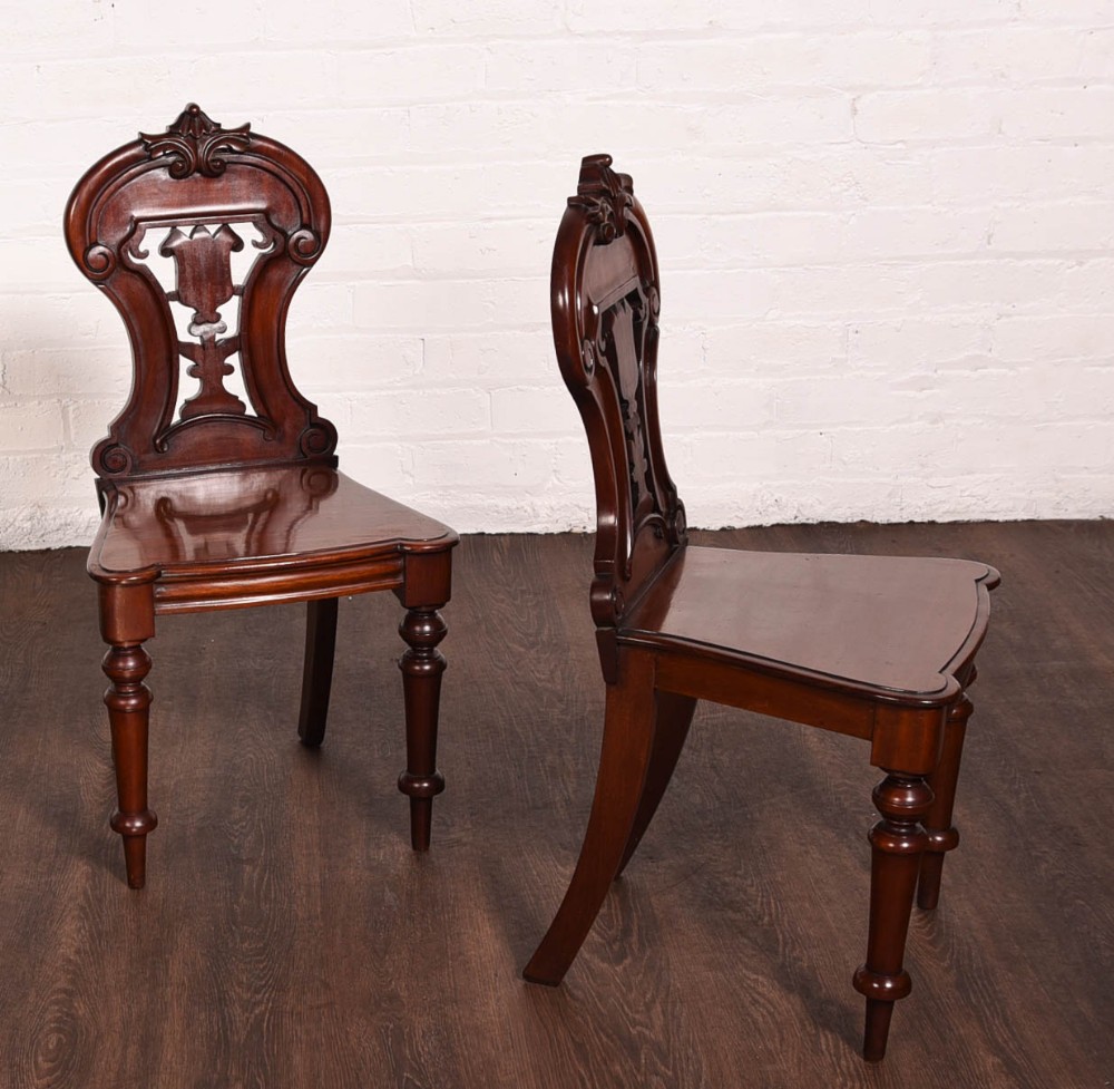 Exceptional pair of Victorian Mahogany hall chairs 