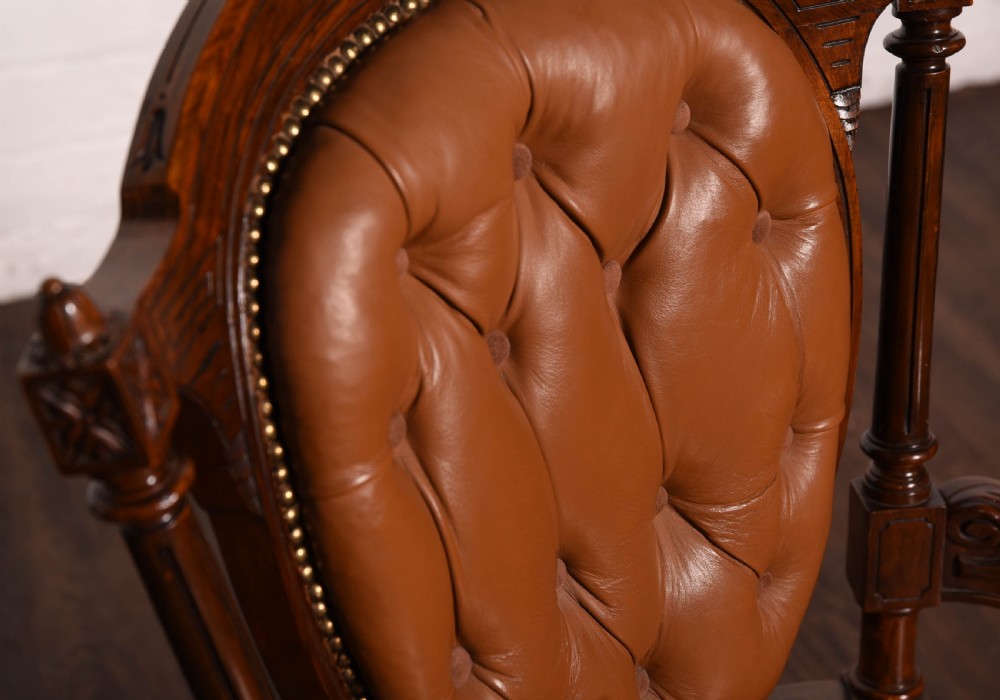 Victorian Solid carved walnut leather button back chair View III