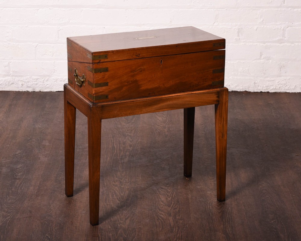 Brass bound Mahogany campaign writing desk on stand 