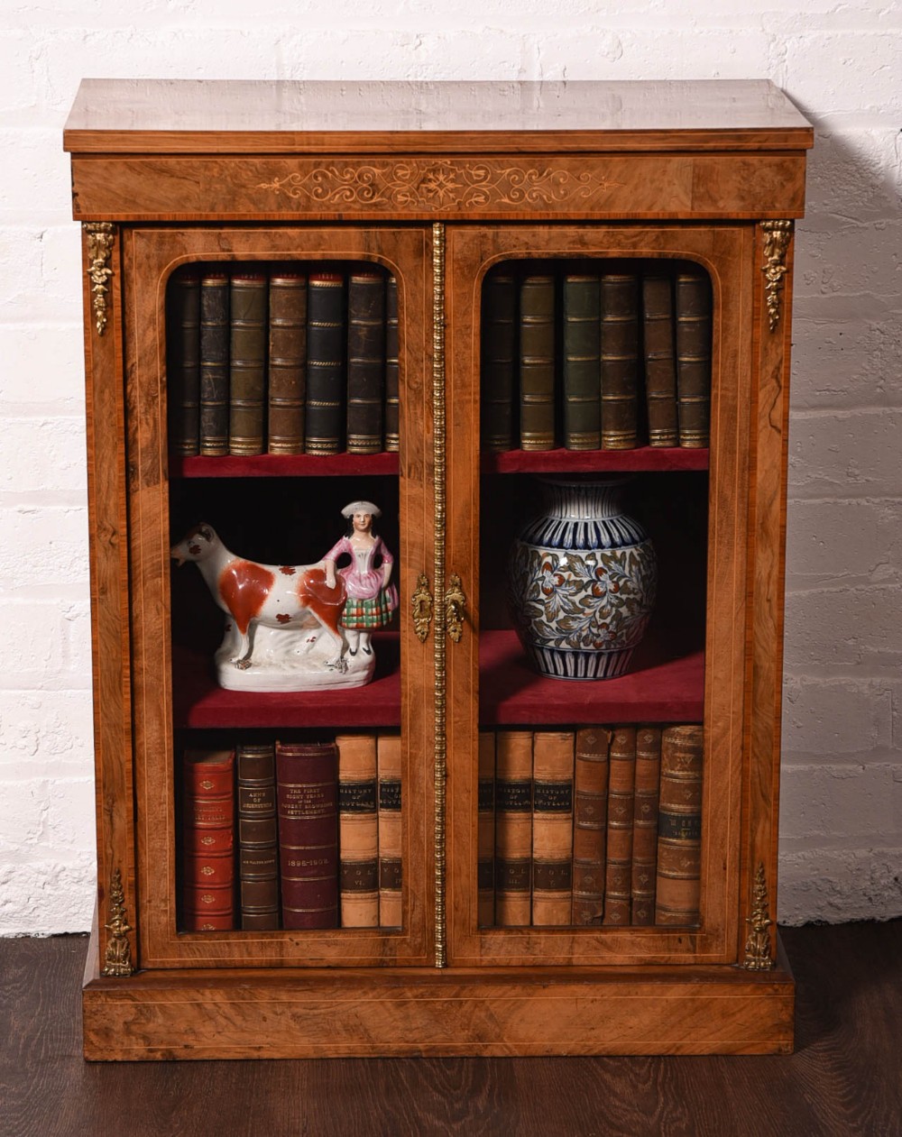 Burr Walnut 2 door inlaid bookcase of neat proportions 