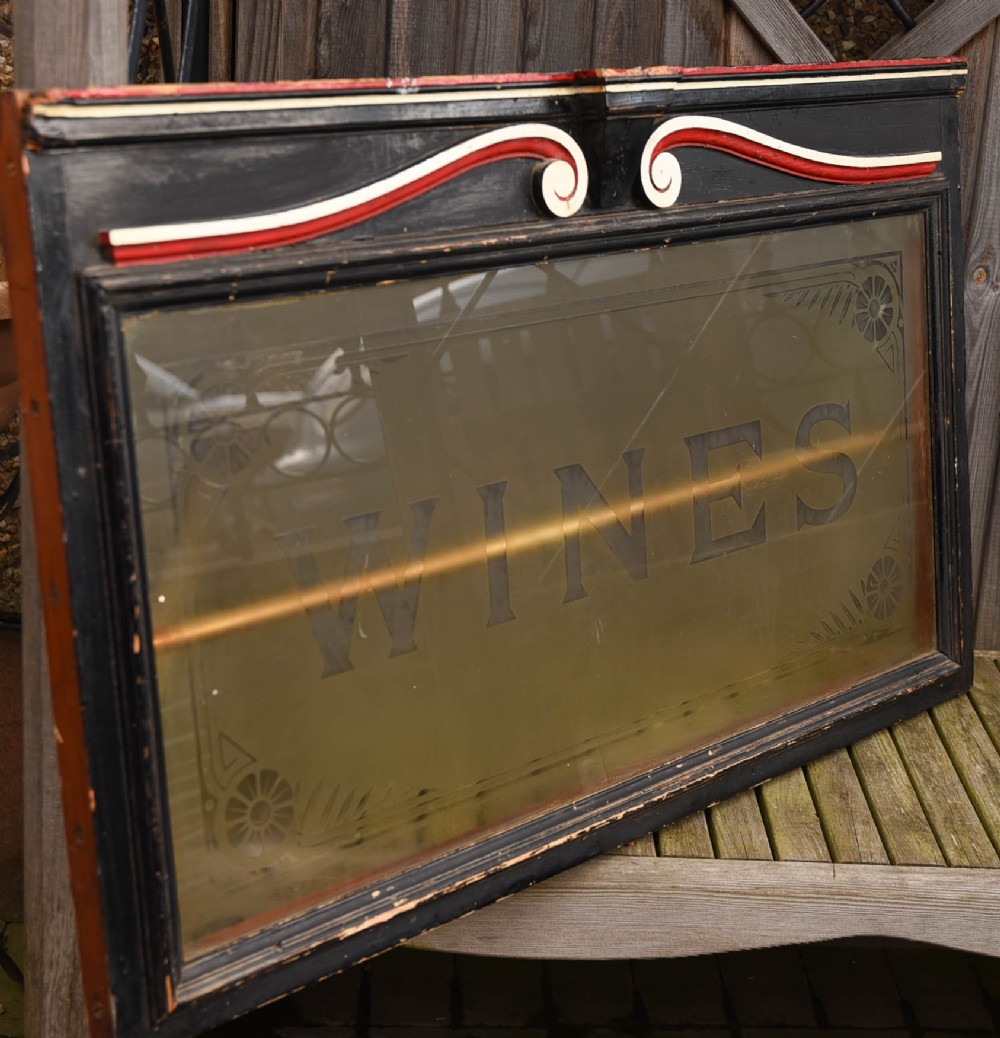 Edwardian bar window etched with WINES 
