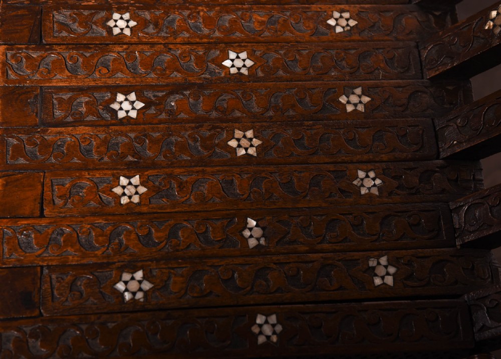 A rare pair late 19th century Islamic carved folding chairs  View IV