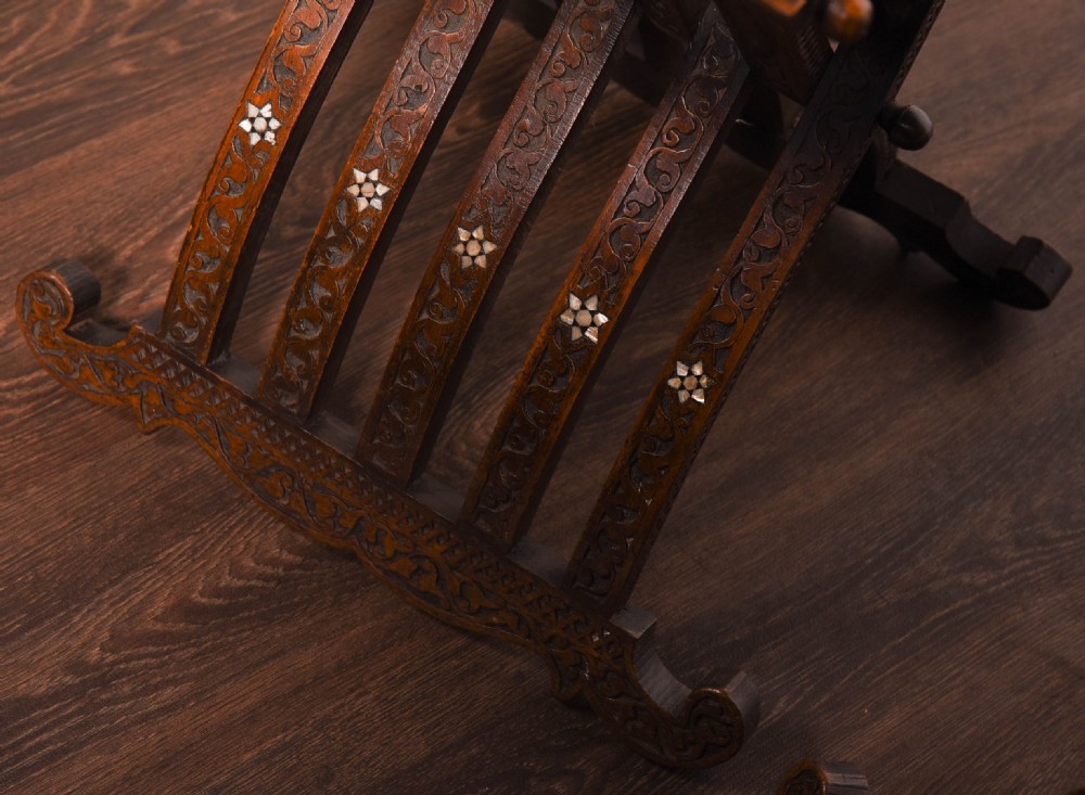 A rare pair late 19th century Islamic carved folding chairs  View VII