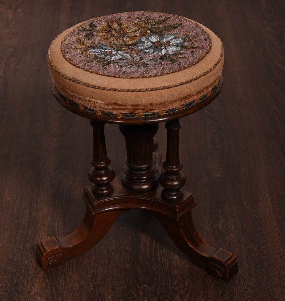 Victorian Mahogany Revolving piano stool with a bead work  seat 