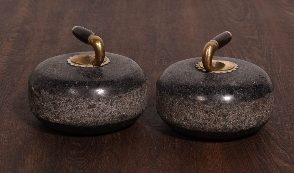 Pair or granite curling stones 