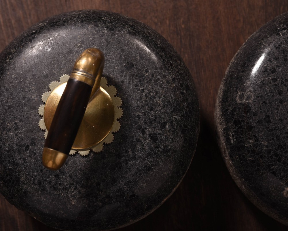 Pair or granite curling stones  View IV