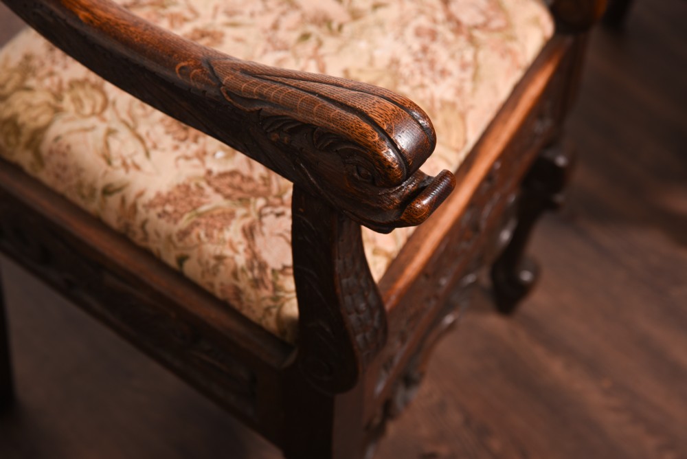 A stunning pair of carved oak arm chairs  View III