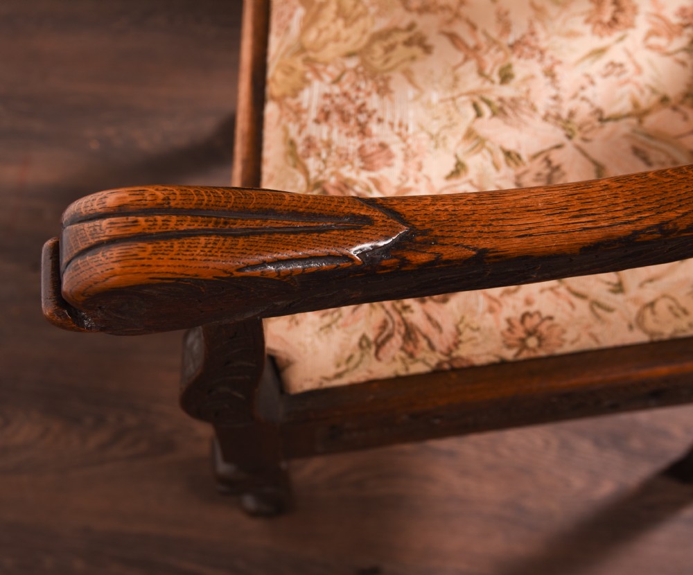 A stunning pair of carved oak arm chairs  View XIII