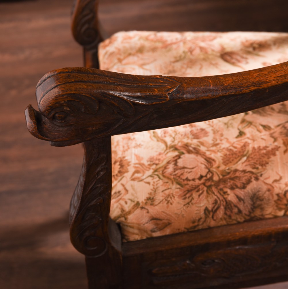 A stunning pair of carved oak arm chairs  View XIV