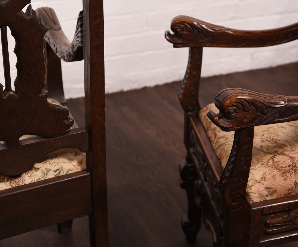 A stunning pair of carved oak arm chairs  View XVI