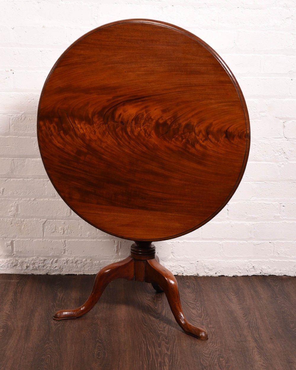 Georgian flame mahogany snap top supper table 