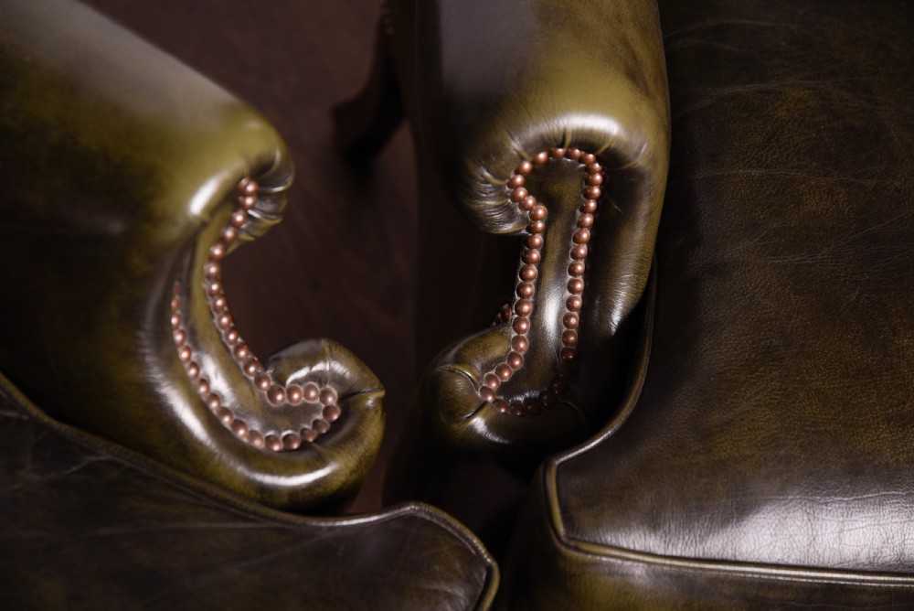 An Elegant pair of hand died leather wing chairs  View IV