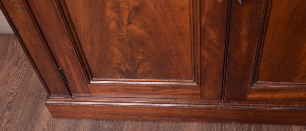 An early 19th century marble top side cabinet  View IV
