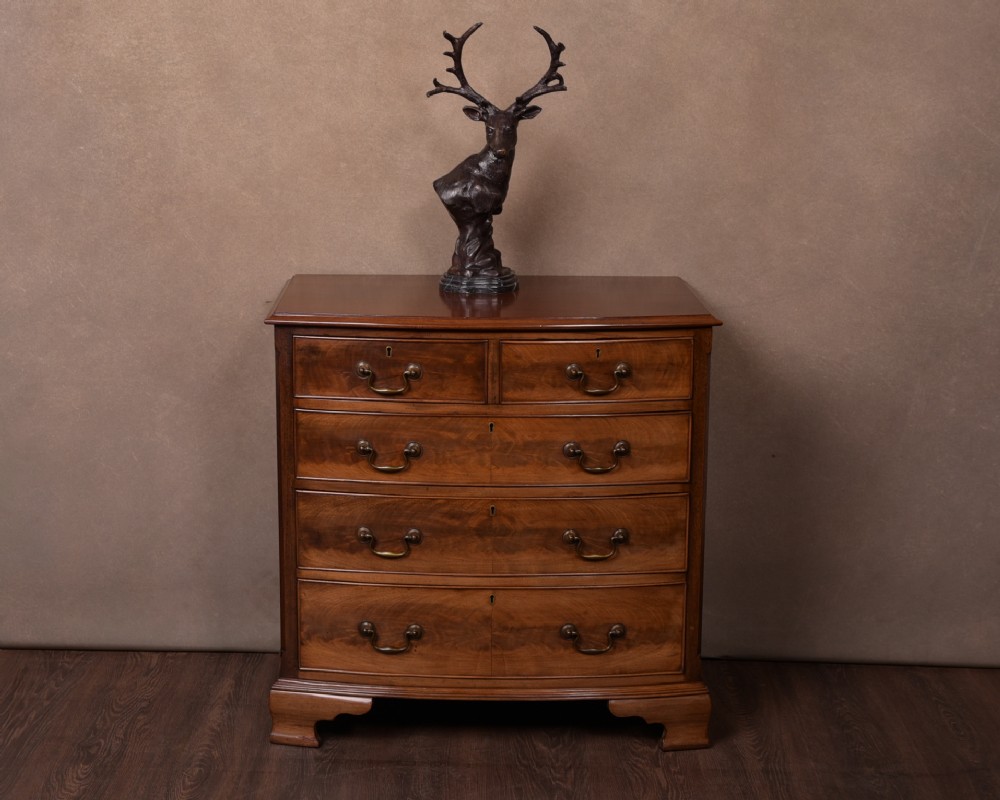 Neat Edwardian flame mahogany bow front 2 over 3 chest of drawers 