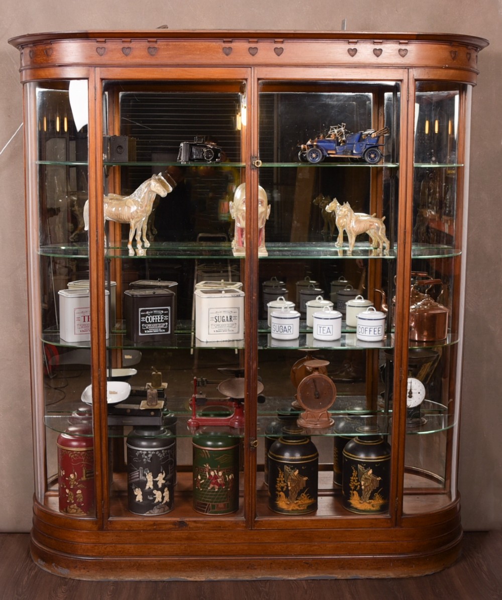 Outstanding Mahogany Edwardian bow sided shop fitting 