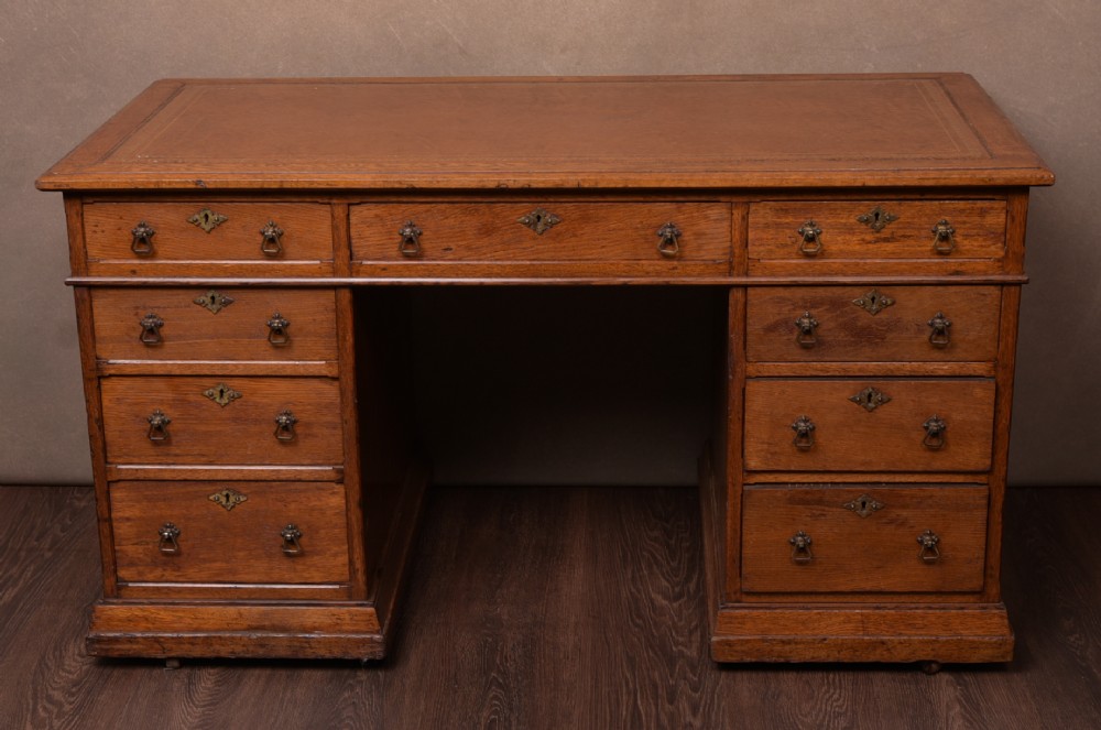 Edwardian Oak Knee hole writing desk 
