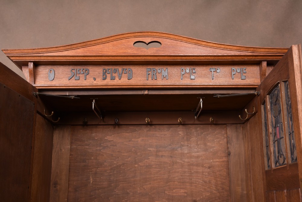 Outstanding oak Arts and crafts Wardrobe attributed to Liberty & Co  View XI
