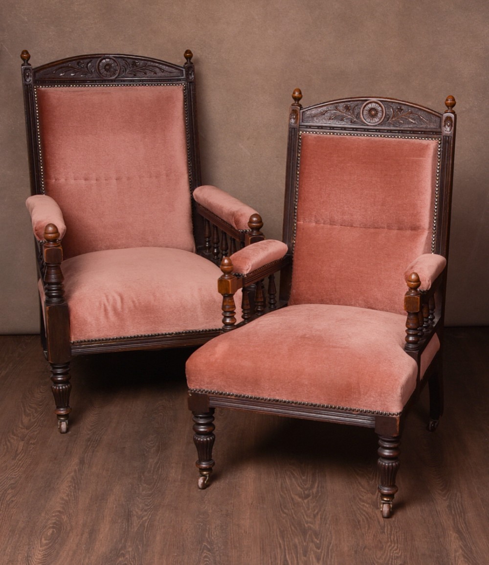 Pair of Edwardian Carved oak ladies and gents arm chairs 