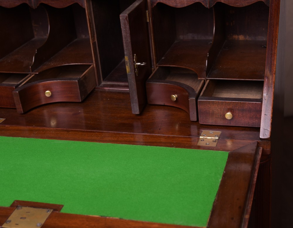 A neat proportioned Georgian Mahogany writing bureau  View VI