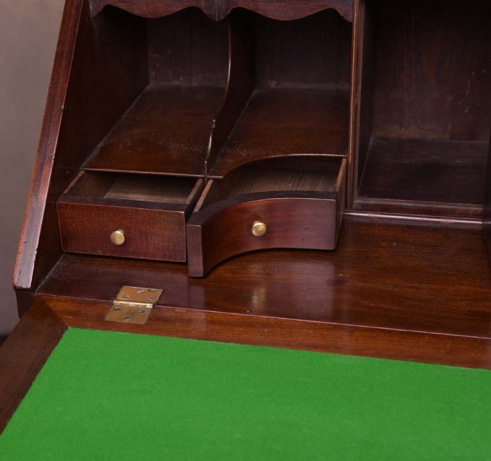 A neat proportioned Georgian Mahogany writing bureau  View VIII