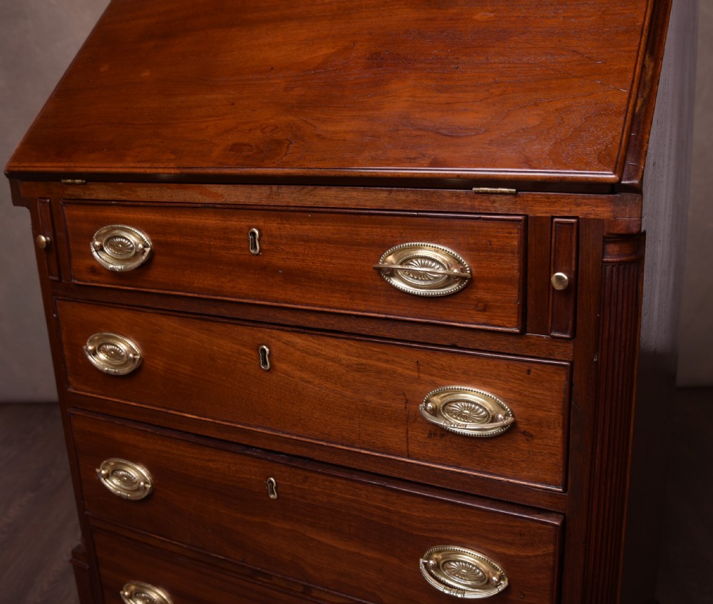 A neat proportioned Georgian Mahogany writing bureau  View XIII