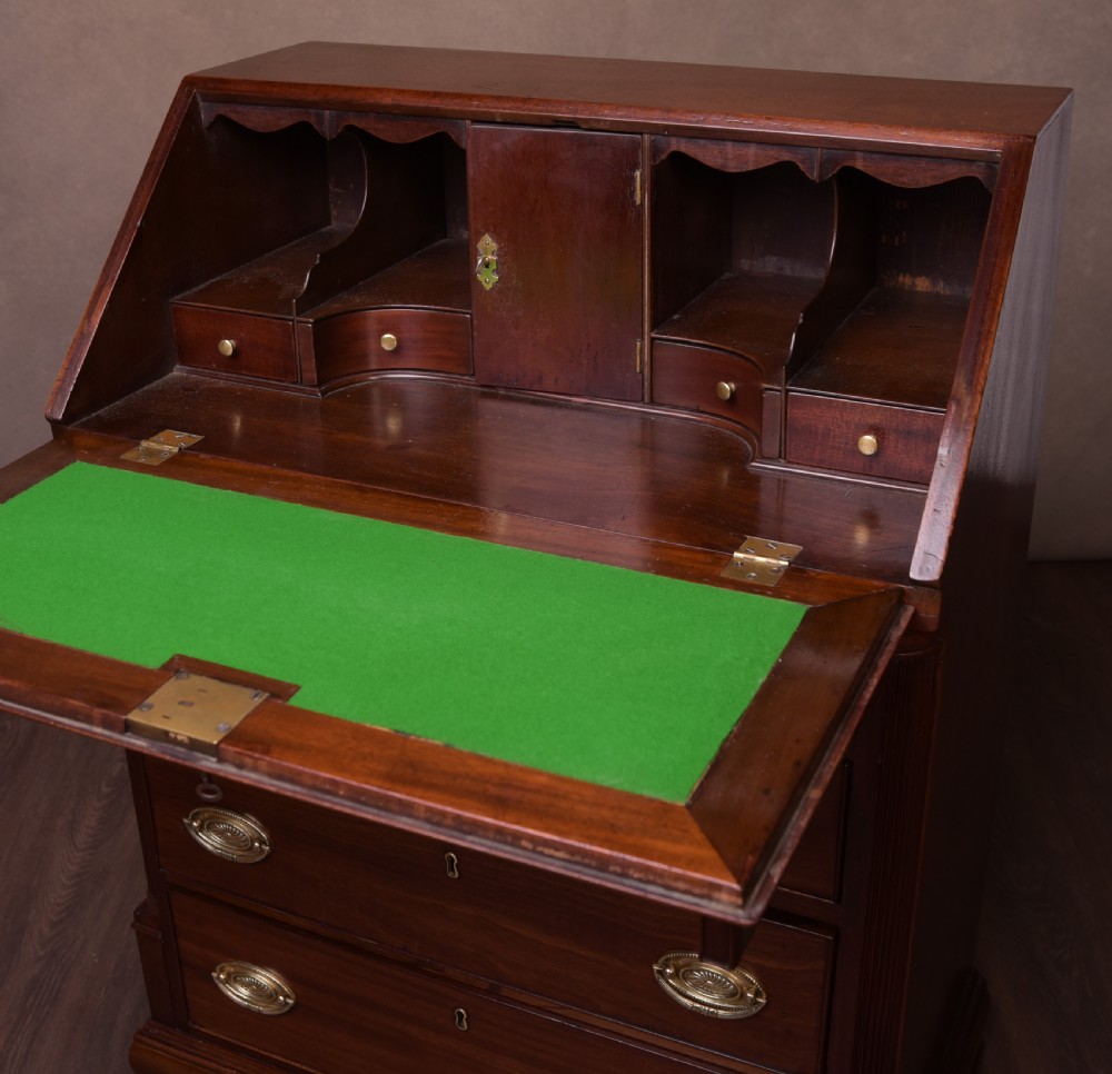 A neat proportioned Georgian Mahogany writing bureau  View XIX