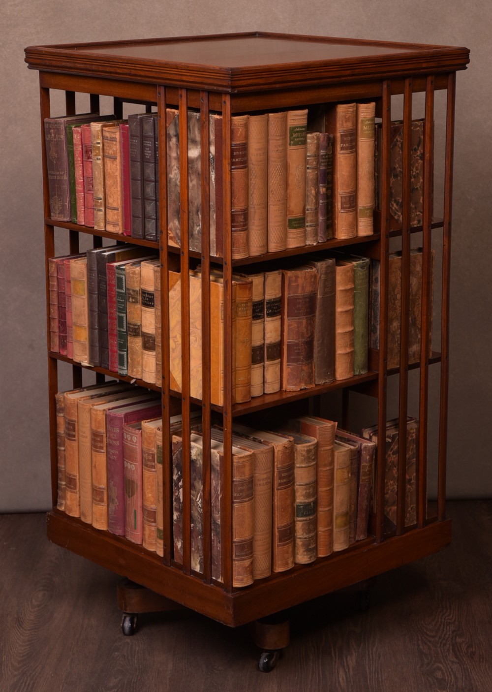 Oversized Edwardian walnut revolving bookcase 