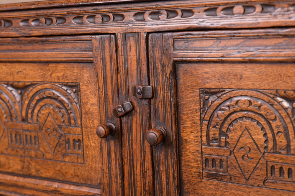 Neat Carved oak sideboard  View II
