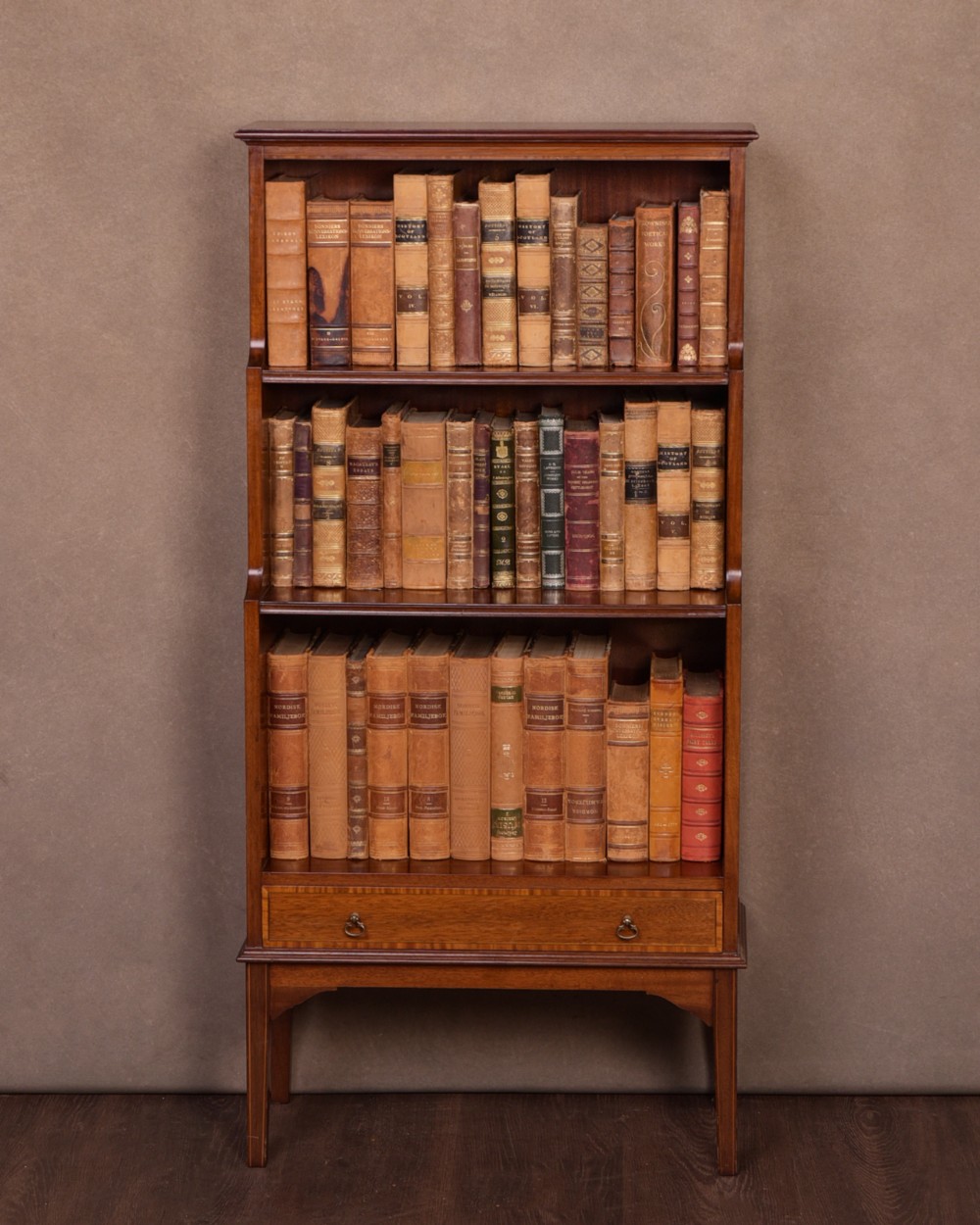 Neat Edwardian mahogany waterfall bookcase 