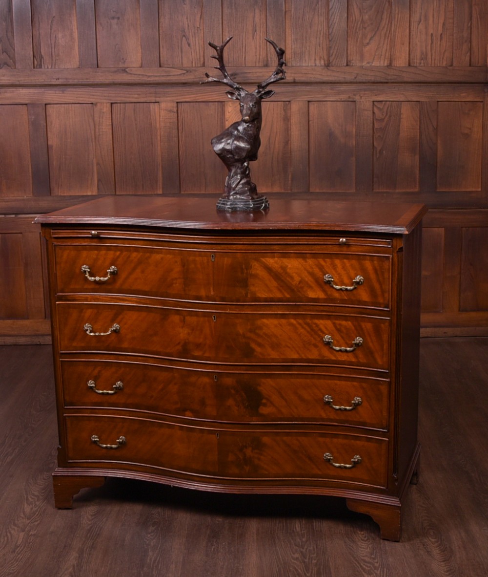 Edwardian Flame Mahogany serpentine 4 drawer chest  