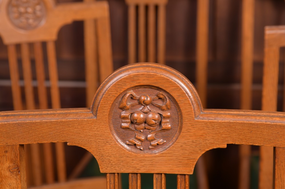 Set of 8 Oak Arts and crafts dining chairs View II