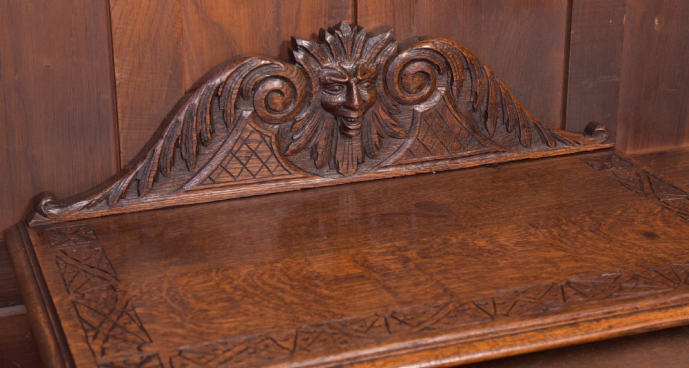 Carved oak green man Hall table View X