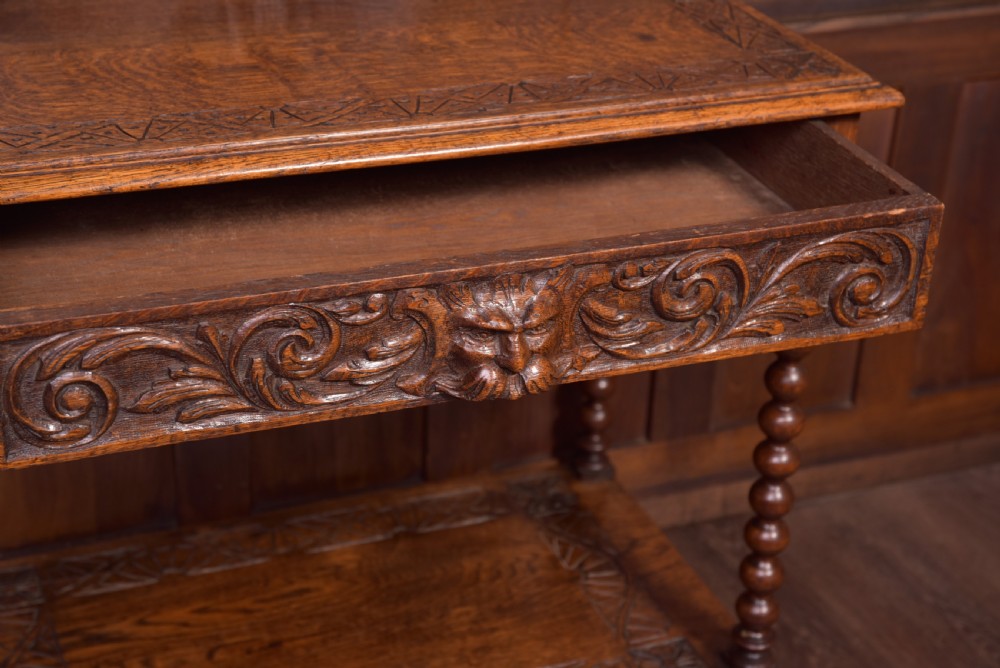 Carved oak green man Hall table View XVI