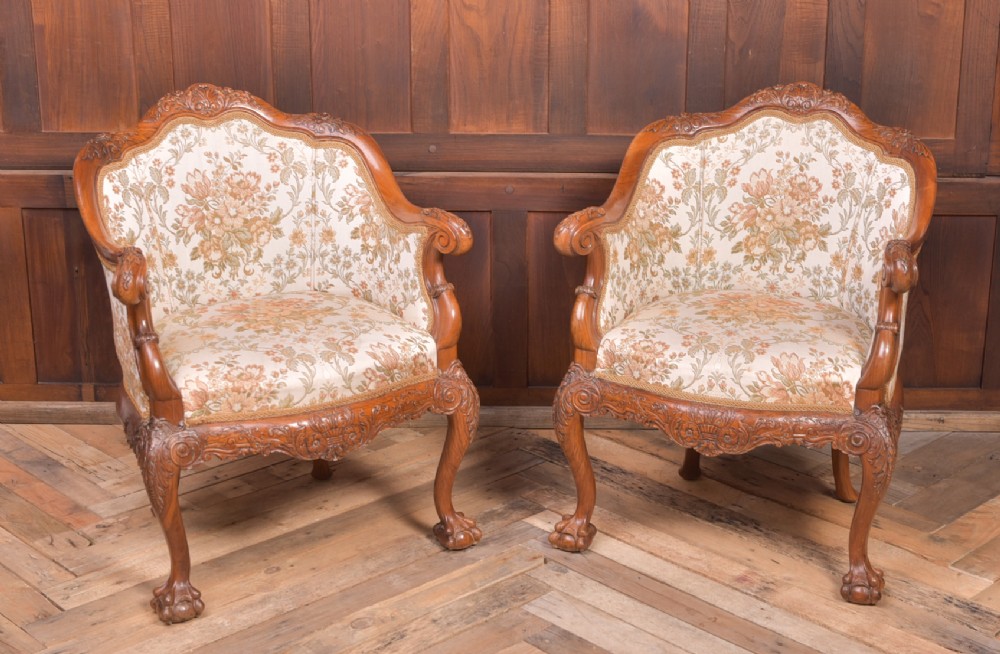Superb pair of carved Walnut tub chairs