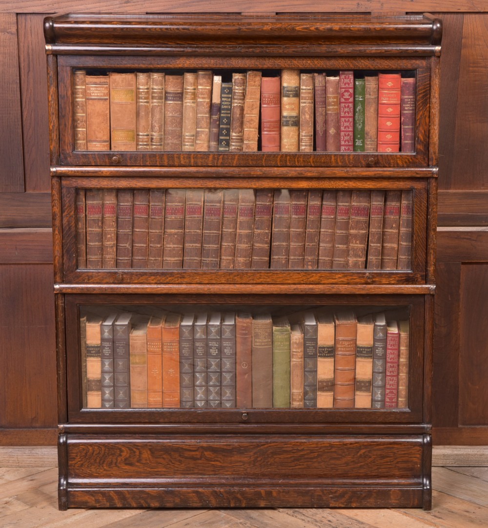 Neat 3 sectioned globe Wernicke Oak  Bookcase 