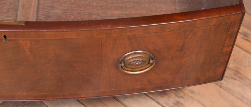 A Neat proportioned Edwardian Mahogany bow fronted wardrobe  View IX