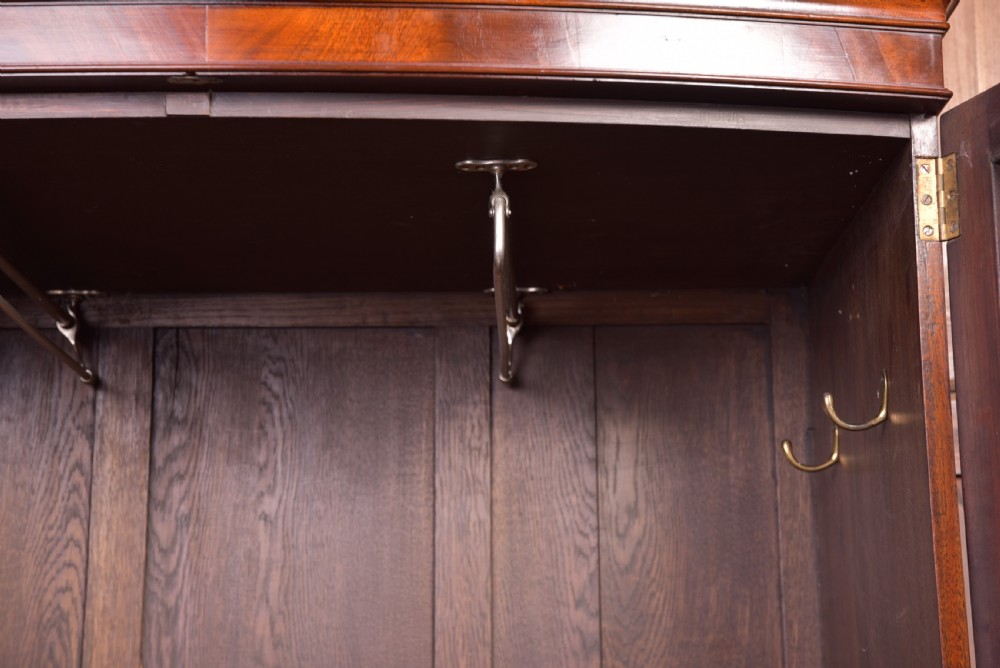 A Neat proportioned Edwardian Mahogany bow fronted wardrobe  View X