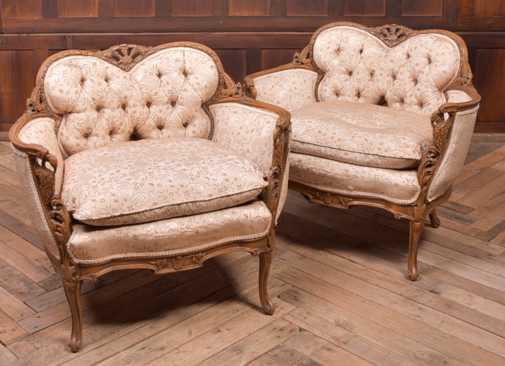 Pair of French  carved Walnut Arm Chairs 