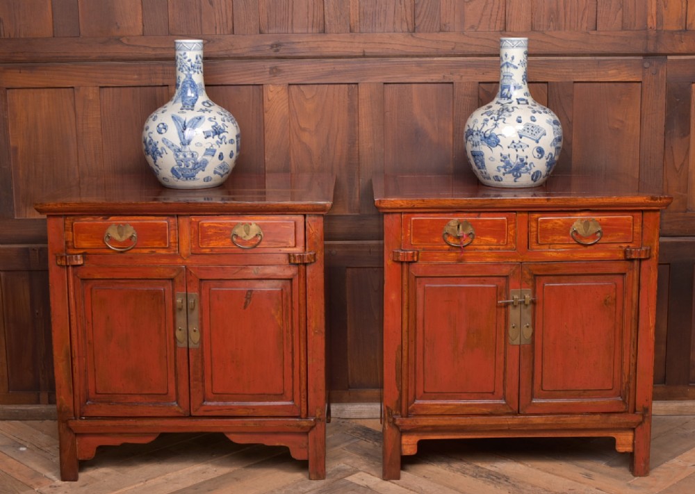 Pair of Chinese red lacquered side cabinets  