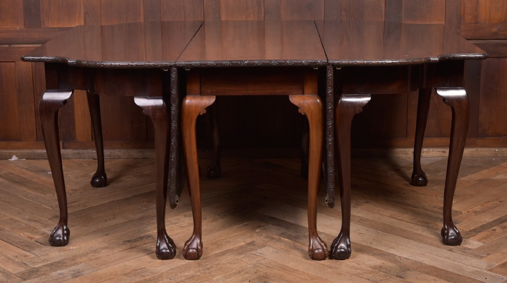 Unusual Extending 3 part Chippendale dining table 