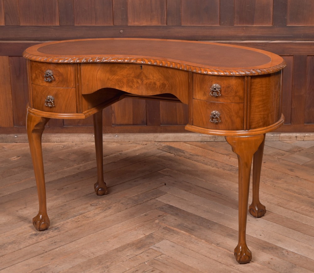 Edwardian walnut kidney shaped desk