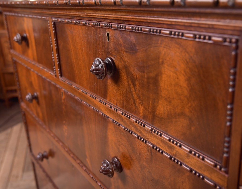 Edwardian Flame Mahogany Chest of Drawers







 View III