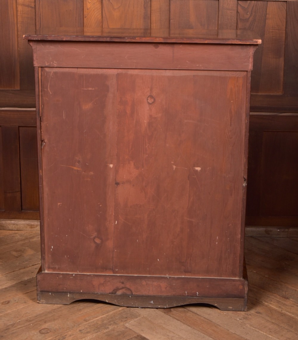 A Victorian walnut pier cabinet with a glazed single door, floral marquetry inlay, gilded ormolu mounts, and a red fabric-lined interior with shelves. View VIII