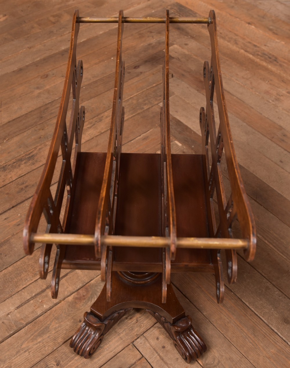Victorian mahogany sheet music rack featuring pierced fretwork sides, divided compartments, a turned pedestal column, and carved scroll feet. View XIII